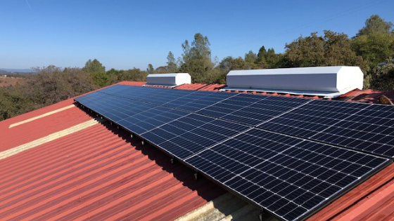 Close up view of solar panels installed on top of a bard.