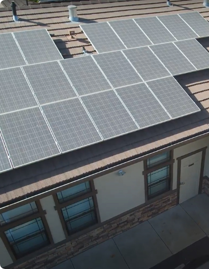 Close up view of solar panels installed on top of a residential home.