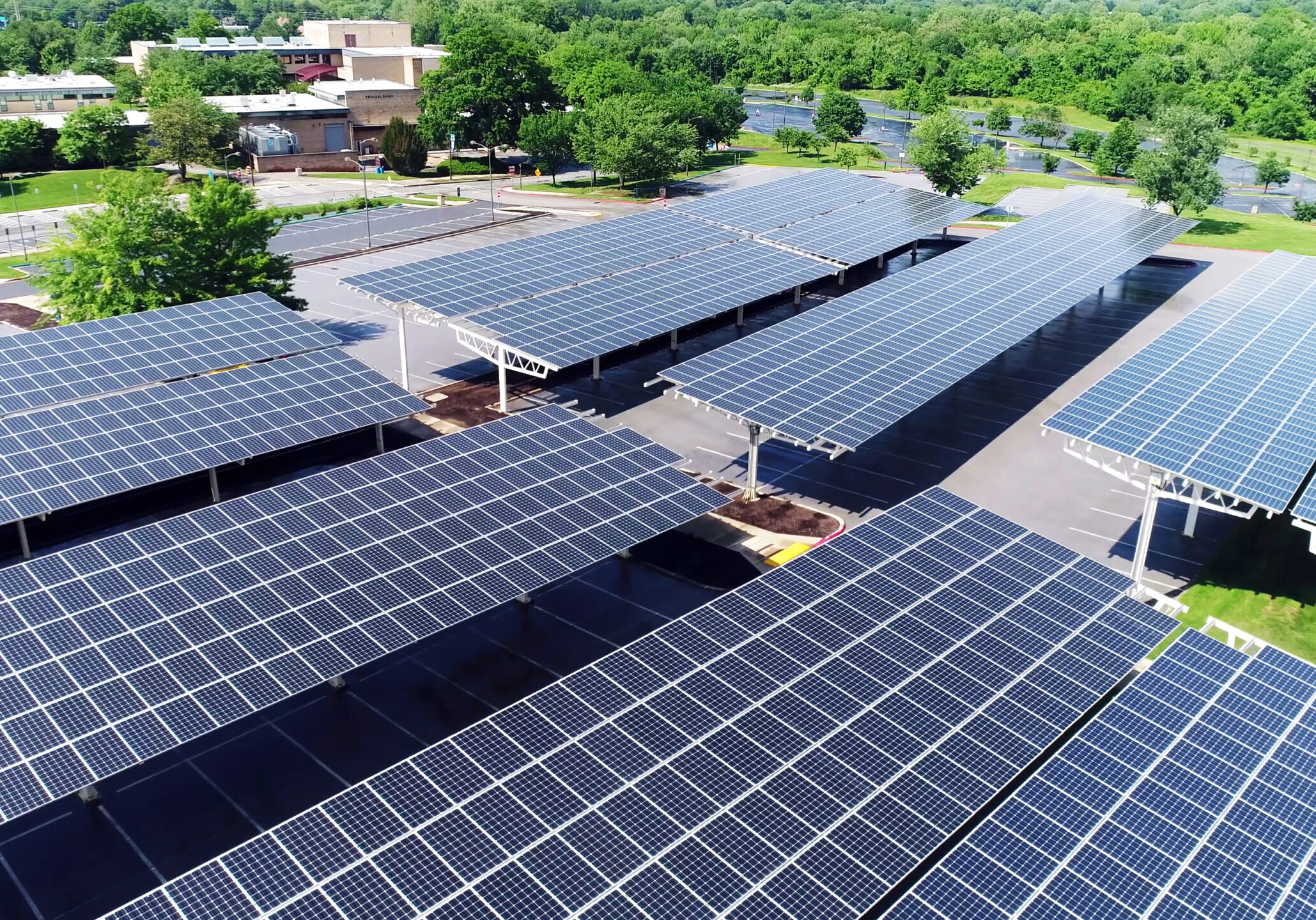 solar power in car station, Aerial view of solar paneled covered parking roof